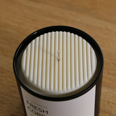 A close view of Fresh Corduroy candle design.