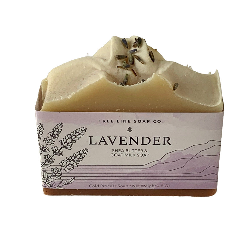 A single bar of Lavender soap is wrapped in a white and light violet label.